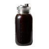 Wide mouth glass jar filled with dark cold brew coffee, topped with a stainless steel lid and fine mesh infuser, designed for brewing coffee and tea, featured in kitchen and food collections.
