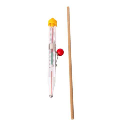 Glass candle thermometer with yellow top and red adjustment knob alongside wooden stirring stick, handcrafted for precise soy candle making in Lamps & Lighting, Candles and Candlemaking, Candlemaking Supplies, and Best Sellers collections.