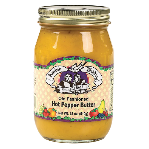 Glass jar of handcrafted old fashioned hot pepper butter in a gold metal lid jar, made in USA, featured in Kitchen & Food, Food, Pantry, USA Made, and Best Sellers collections at Lehman’s.