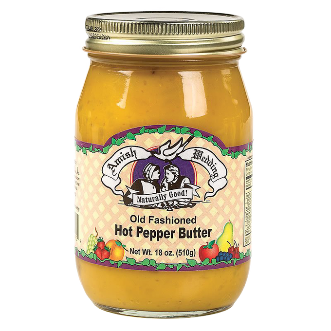 Glass jar of handcrafted old fashioned hot pepper butter in a gold metal lid jar, made in USA, featured in Kitchen & Food, Food, Pantry, USA Made, and Best Sellers collections at Lehman’s.