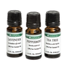 Three amber glass bottles of pure essential oils labeled lavender, peppermint, and tea tree, designed for aromatherapy, health remedies, and crafting uses.