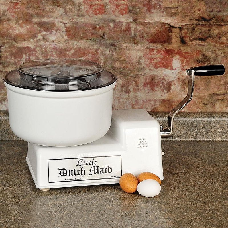 Handcrafted dual speed hand-cranked mixer with white base and clear lid, designed for efficient mixing without electricity, featuring Amish made quality from USA Made collections.