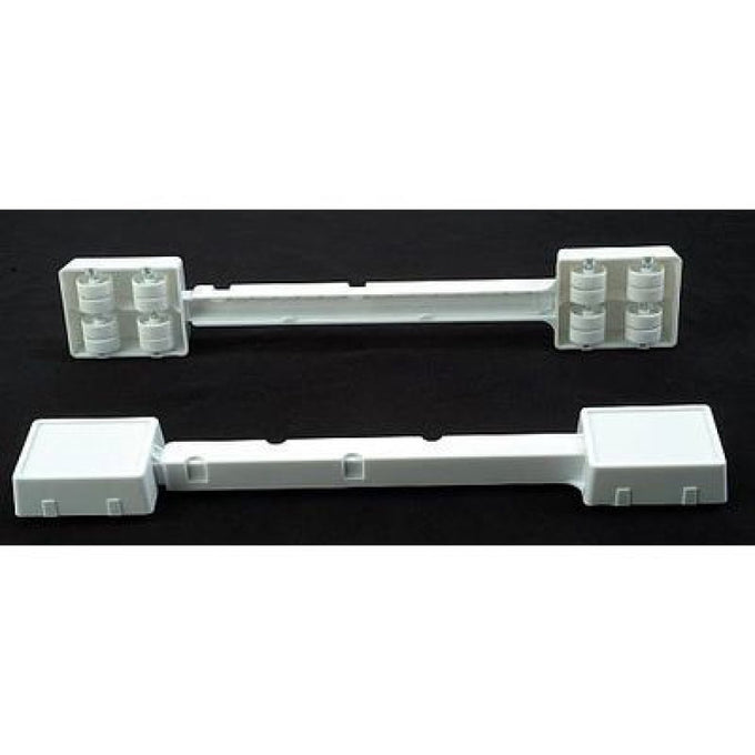 Set of adjustable white plastic appliance rollers designed to raise and easily move heavy household appliances, ideal for use in home & decor, stoves, and refrigerators collections.