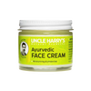 Small glass jar of handcrafted Ayurvedic face cream featuring moisturizing jojoba esters and soothing turmeric and sandalwood oils, made in USA for health and wellness.
