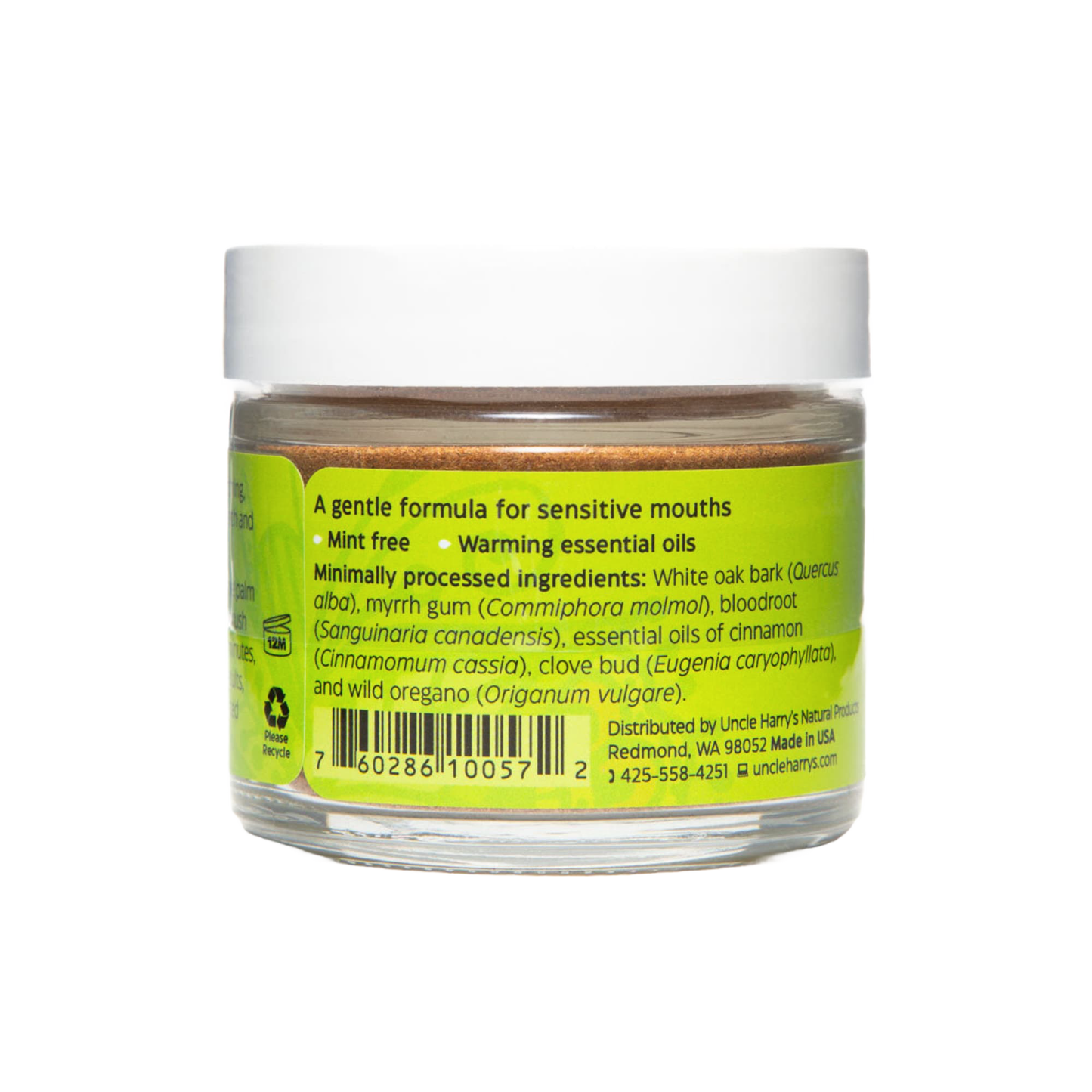 Clear jar of handcrafted tooth powder with white lid showing label that highlights a gentle, mint-free formula with warming essential oils, made in USA, suitable for health remedies, grooming, and wellness collections.