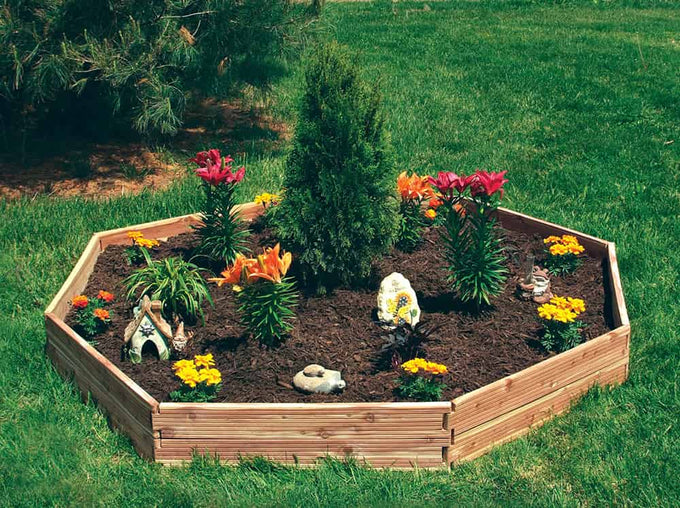 Handcrafted cedar garden bed kit assembled in an octagonal shape, planted with vibrant flowers and greenery, highlighting USA made quality for Farm, Garden & Tool collections.
