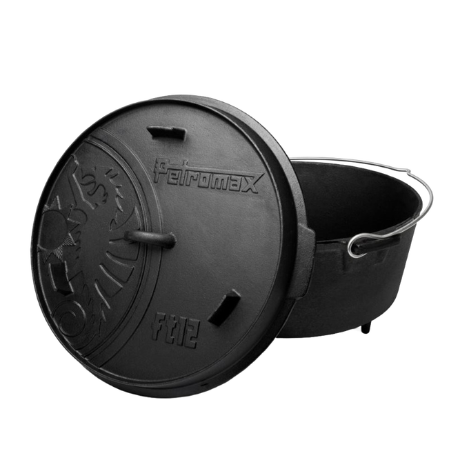 Handcrafted cast iron Dutch oven with three legs, featuring an embossed decorative lid and wire bail handle, perfect for Kitchen & Food, Cookware, Cast Iron, Best Sellers, Promo Eligible collections.