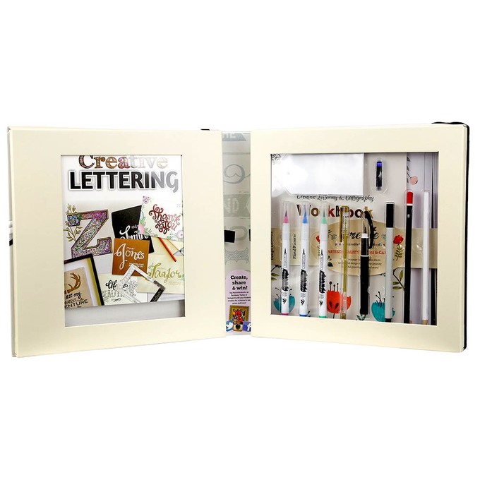 Open creative lettering kit featuring assorted calligraphy markers, pens, instruction booklet, and guides, designed for arts and crafts in Children’s Toys and Books collections.