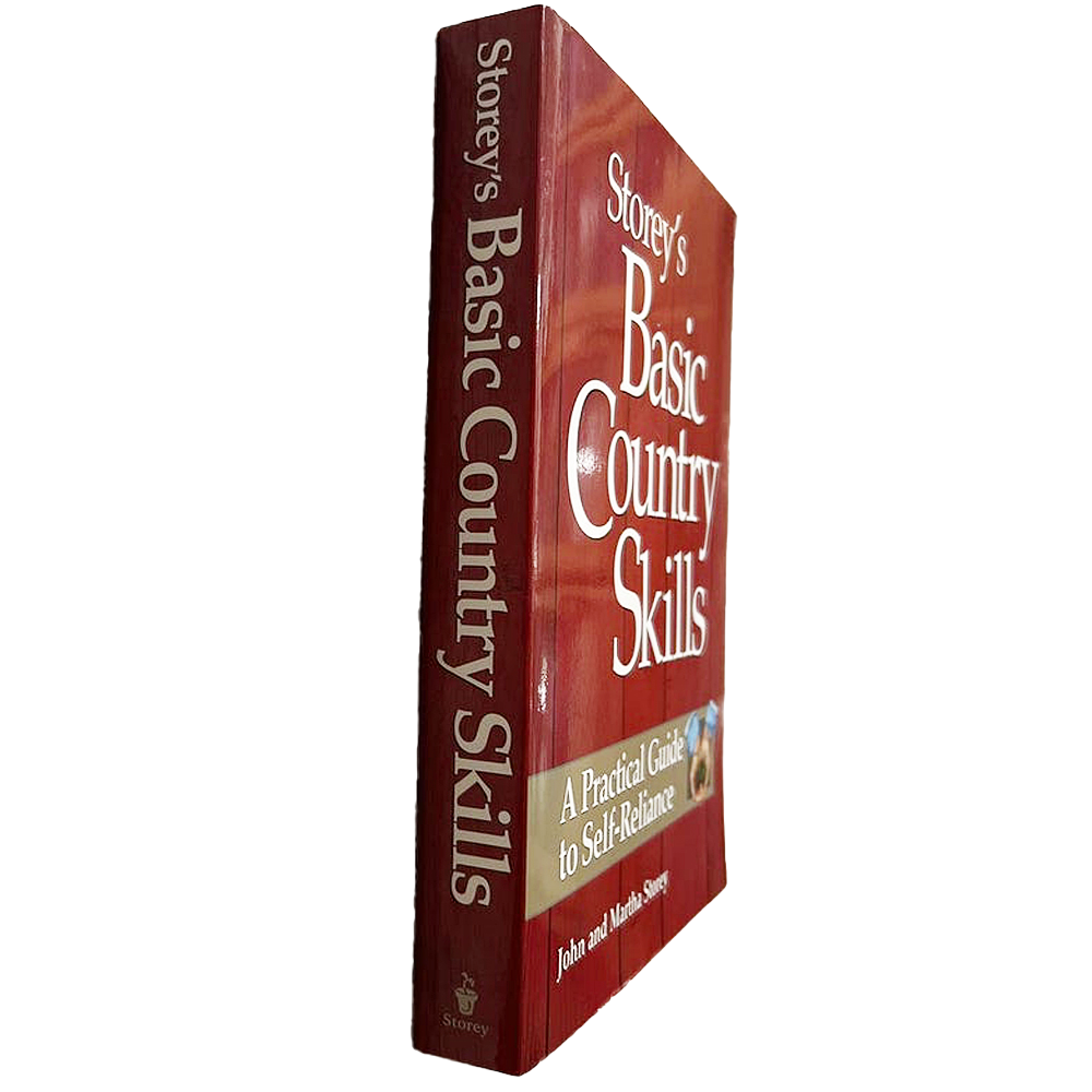 Hardcover book titled Basic Country Skills with a deep red cover, offering practical self-reliance guidance, featured in Books, Home and Garden How-To, and Heritage collections.