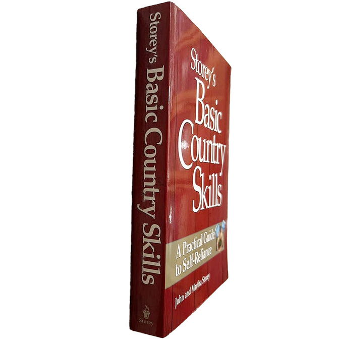 Hardcover book titled Basic Country Skills with a deep red cover, offering practical self-reliance guidance, featured in Books, Home and Garden How-To, and Heritage collections.