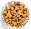 Clear glass bowl filled with handcrafted caramelized black walnuts coated in a sweet buttery glaze, featured in Kitchen & Food, Snacks and Sweets, Pantry, and USA Made collections.