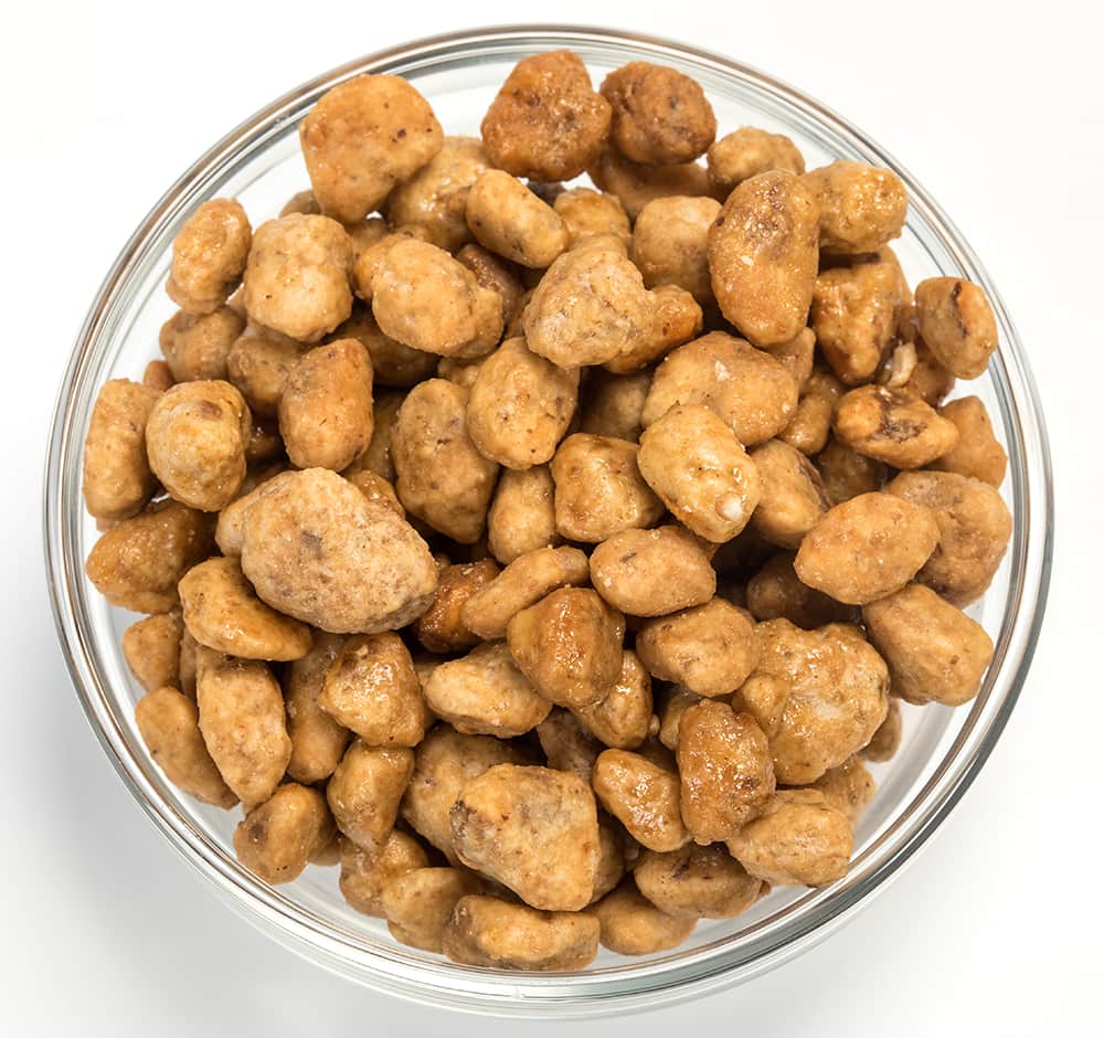 Clear glass bowl filled with handcrafted caramelized black walnuts coated in a sweet buttery glaze, featured in Kitchen & Food, Snacks and Sweets, Pantry, and USA Made collections.