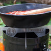 Handcrafted stainless steel fire stand providing stable heat support for outdoor cooking with a cast iron skillet, ideal for Farm, Garden & Tool, Camping, Best Sellers, and Promo Eligible collections.