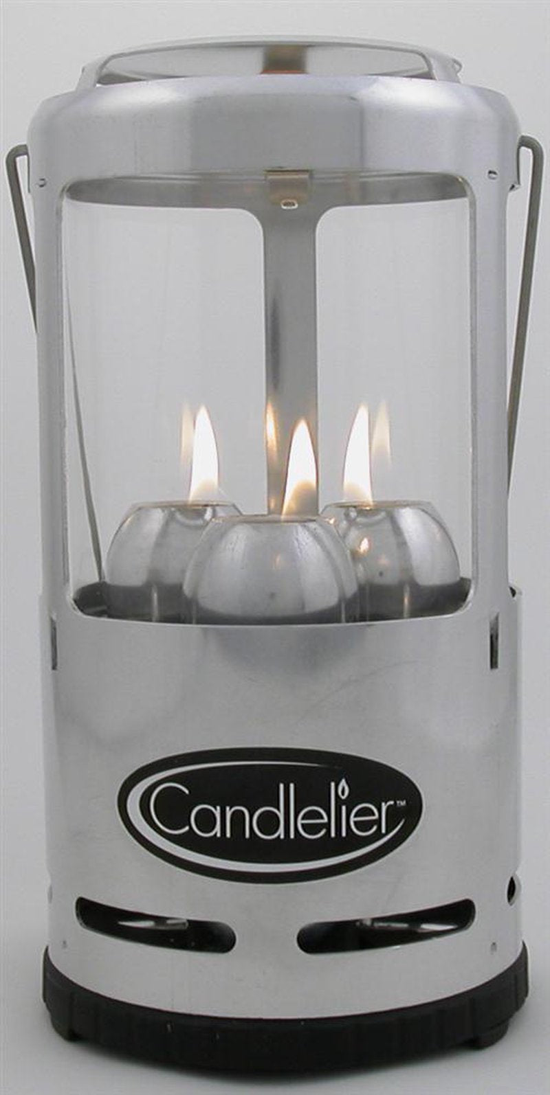Handcrafted durable candle lantern with three burning candles enclosed in a lightweight metal frame and glass, perfect for camping, emergency supplies, and outdoor lighting.