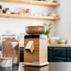 Electric grain mill with natural bamboo finish and top bowl, designed for versatile grain grinding in Kitchen & Food, Grain Mills, Best Sellers, and Bread Making Supplies collections.
