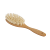Handcrafted beechwood hairbrush with seven rows of natural Tampico bristles, designed for gentle scalp stimulation, featured in Health & Wellness and Grooming collections.