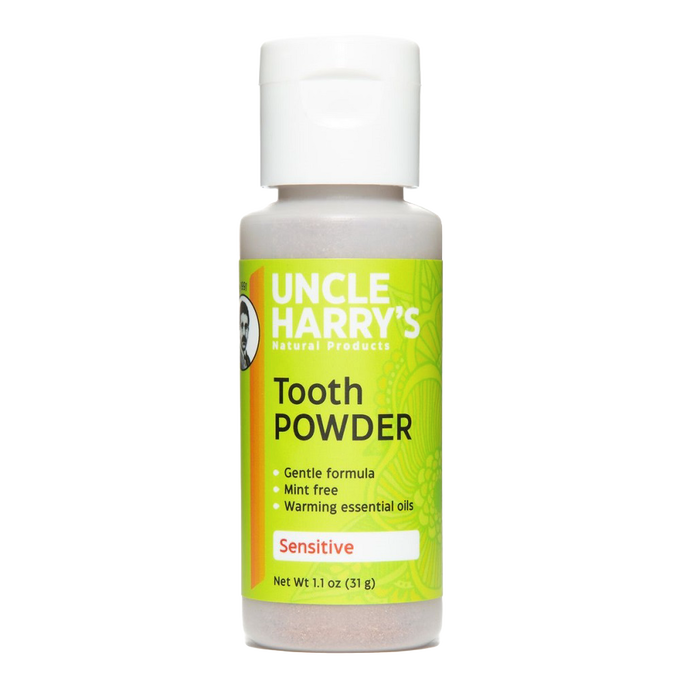 Small plastic bottle of handcrafted tooth powder for sensitive teeth with bright green label listing gentle, mint-free formula and warming essential oils, included in Health & Wellness, Health Remedies, Grooming and Personal Hygiene, USA Made, Best Sellers, and Promo Eligible collections.
