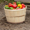 Handcrafted untreated poplar wood bushel basket with metal wire accents filled with fresh red, green, and yellow bell peppers, perfect for Farm, Garden & Tool, Garden Accessories, USA Made, Best Sellers, and Promo Eligible collections.