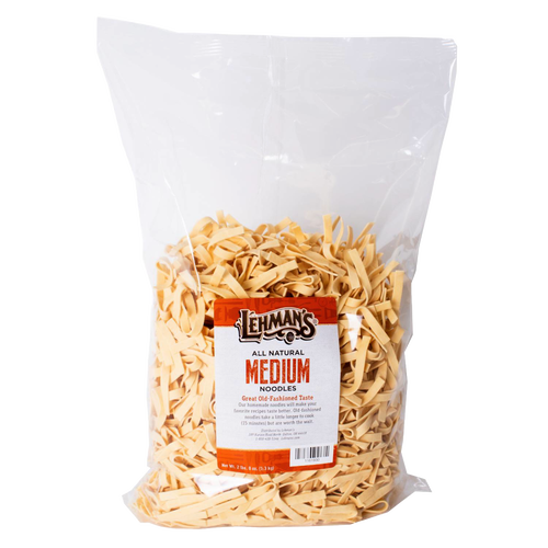 Clear bag of handcrafted medium-width egg noodles made in USA, perfect for Kitchen & Food, Food, Pantry, USA Made, Best Sellers, and Promo Eligible collections.