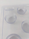 Clear plastic round soap mold with multiple cavities for creating 2.5 oz bars, designed for soapmaking enthusiasts and included in Health & Wellness and USA Made collections.