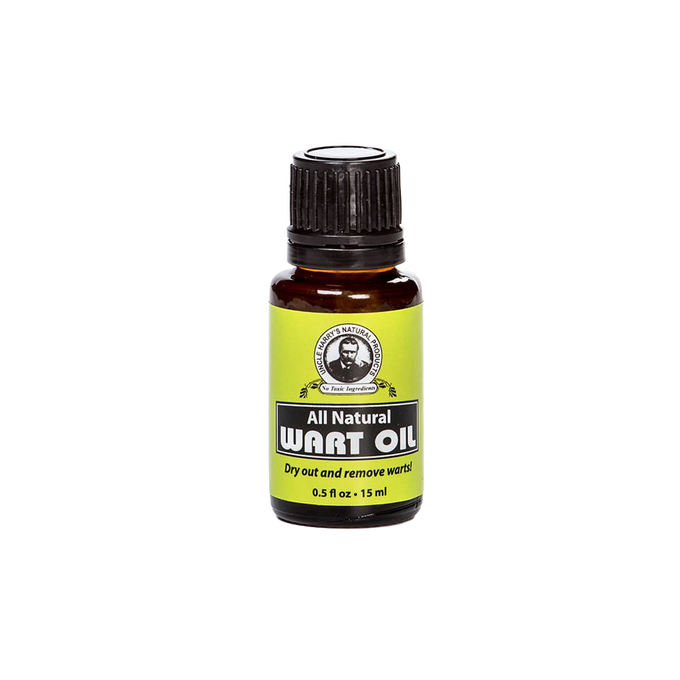Small amber glass bottle of all-natural wart oil with a bright green label featuring cinnamon, clove, and oregano oils, handcrafted and made in USA for health remedies.