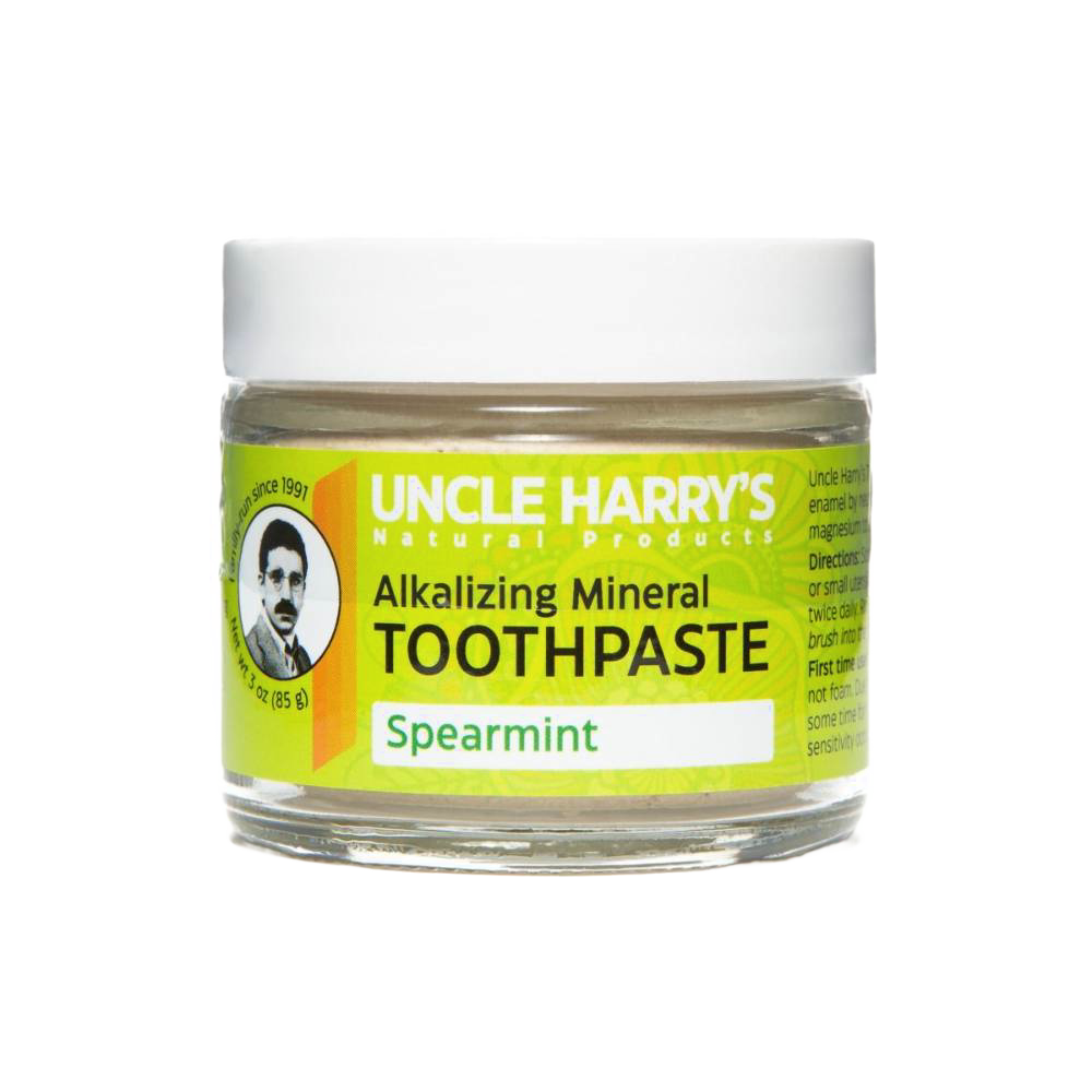 Handcrafted small glass jar of all-natural alkalizing mineral toothpaste in spearmint flavor with a bright yellow label and white lid, ideal for Health & Wellness, Grooming and Personal Hygiene, USA Made, and Best Sellers collections.