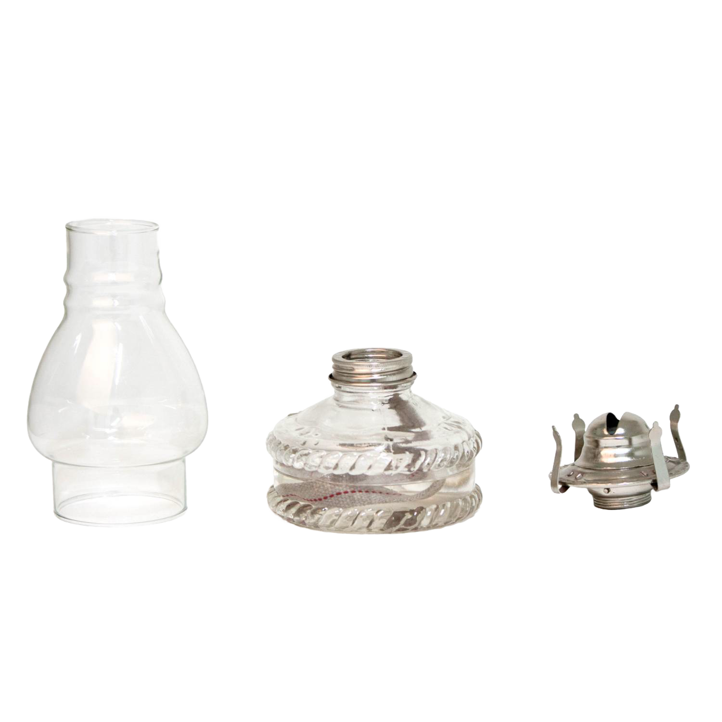 Disassembled handcrafted glass oil lamp components including a clear chimney, glass fuel reservoir with decorative ridges, and a metal burner, ideal for farm, garden, and emergency lighting.