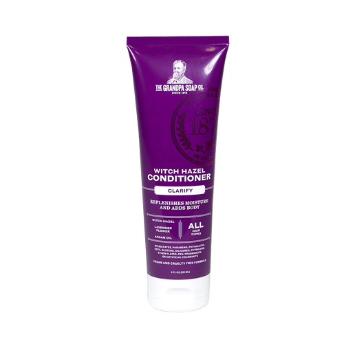 Tube of handcrafted witch hazel conditioner in purple packaging with lavender flower and argan oil, made in USA, featured in Health & Wellness and Grooming collections.