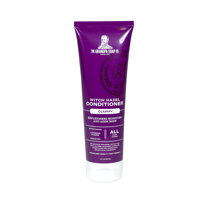 Tube of handcrafted witch hazel conditioner in purple packaging with lavender flower and argan oil, made in USA, featured in Health & Wellness and Grooming collections.