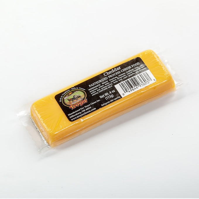 Individually wrapped block of cheddar pasteurized process cheese food, shelf stable and made in USA, featured in Kitchen & Food, Pantry, Best Sellers, and Promo Eligible collections.