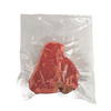 Handcrafted vacuum sealer bag holding a fresh raw steak, designed for food preservation in Kitchen & Food, Freezing, and Best Sellers collections.