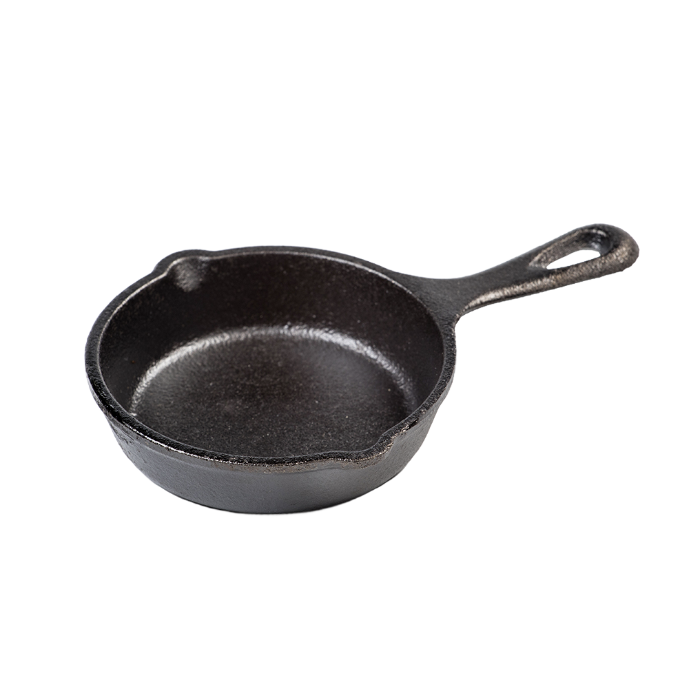Small pre-seasoned cast iron skillet with handle and pouring spouts, ideal for kitchen and food cookware, cast iron, and cooking accessories collections.