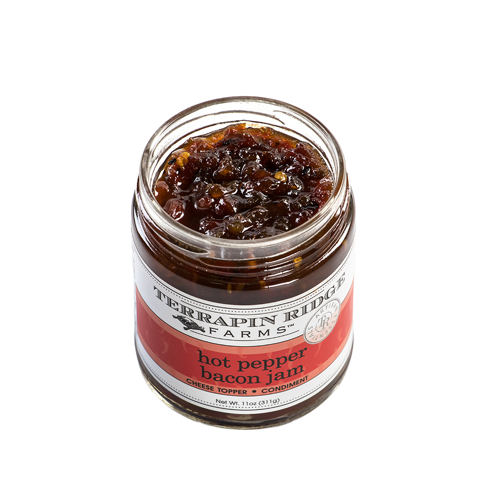 Open jar of handcrafted hot pepper bacon jam showing chunky texture, featured in Kitchen & Food, Pantry, and USA Made collections for flavorful meal enhancements