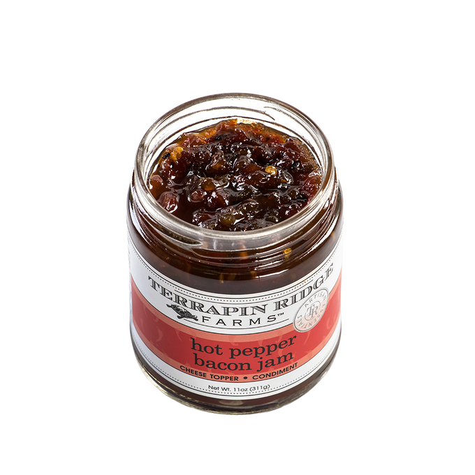 Open jar of handcrafted hot pepper bacon jam showing chunky texture, featured in Kitchen & Food, Pantry, and USA Made collections for flavorful meal enhancements