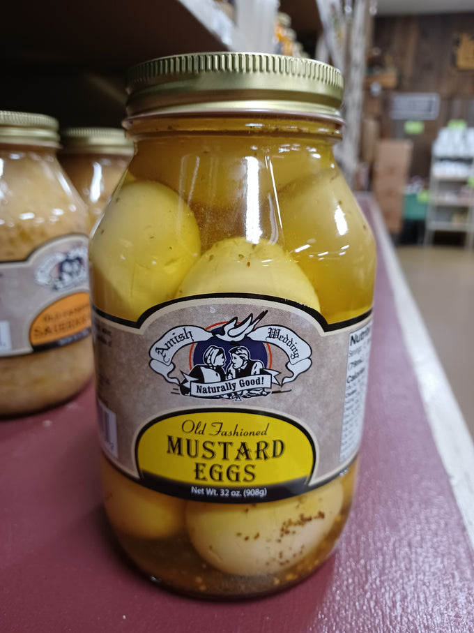 Glass jar of handcrafted Amish made old fashioned mustard eggs in yellow brine with vintage label and gold lid, ideal for Kitchen & Food, Food, Pantry, USA Made, Best Sellers, and Promo Eligible collections.