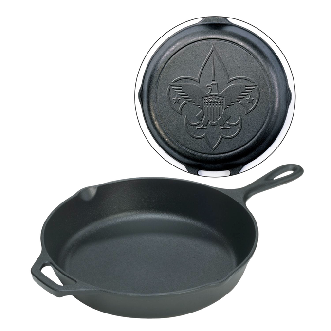 Seasoned black cast iron skillet with embossed Boy Scout emblem on the underside, handcrafted in the USA, featured in Kitchen & Food, Cast Iron, Cookware, USA Made, Best Sellers collections.