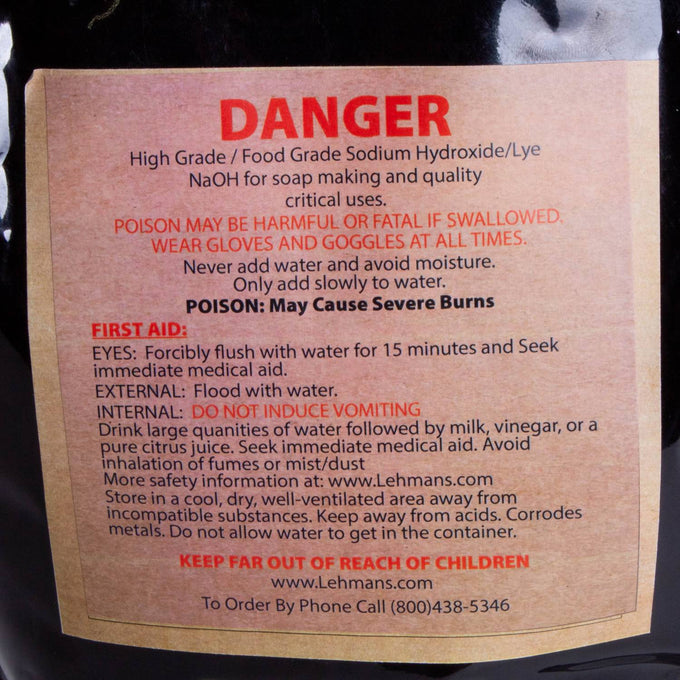 Close-up of a warning label on a resealable bag of high-grade food-grade sodium hydroxide lye beads, detailing safety instructions, first aid, and handling precautions for soapmaking, featured in Health & Wellness, Soaps and Soapmaking, Soapmaking Supplies, USA Made, Best Sellers, and Promo Eligible collections.