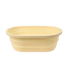 Light beige oval collapsible bread proofing basket made of durable silicone with steel rim, designed for easy dough rising and compact storage in Kitchen & Food and Baking Supplies collections.