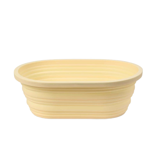 Light beige oval collapsible bread proofing basket made of durable silicone with steel rim, designed for easy dough rising and compact storage in Kitchen & Food and Baking Supplies collections.
