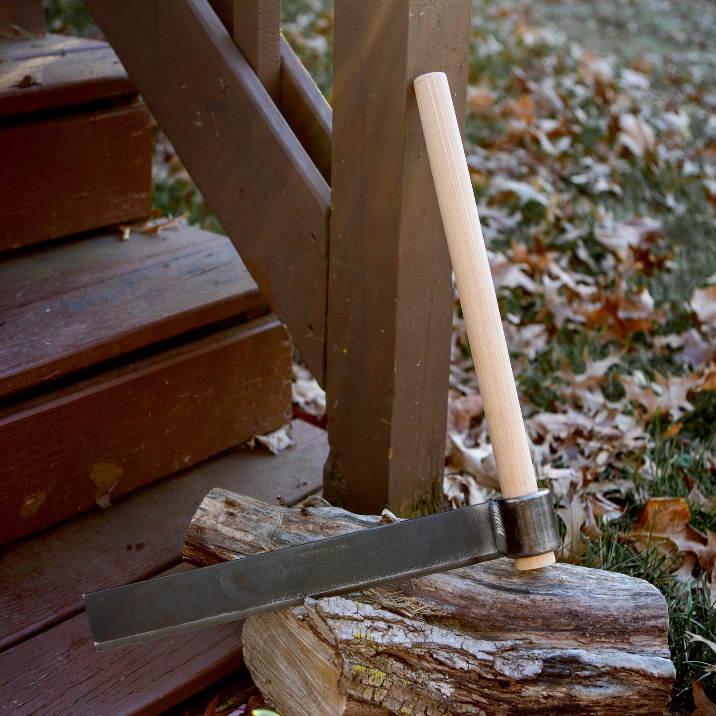 Handcrafted wood splitting froe with a sharp case-hardened steel blade and smooth hickory handle, designed for efficient wood cutting in Farm, Garden & Tool and Wood Cutting collections.