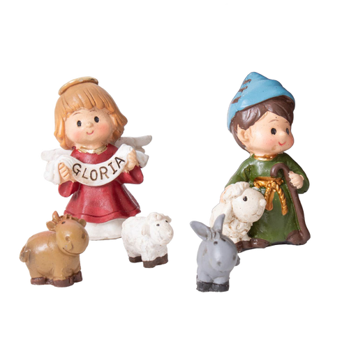 Small handcrafted nativity figurines featuring an angel holding a "Gloria" banner, a shepherd with lamb, and farm animals, perfect for holiday decor and gift giving.
