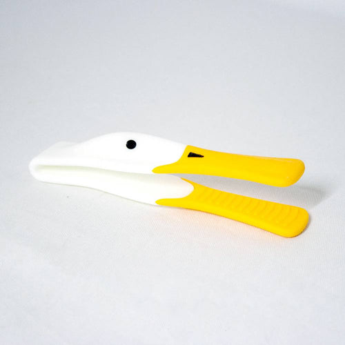 Plastic toast tongs shaped like a duck with a yellow heat-resistant silicone beak and ergonomic handle, designed for kitchen use and serving hot toast safely.