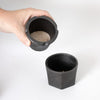 Handheld cast iron spice grinder cup showing freshly ground seasonings inside, part of a handcrafted kitchen gadget set featured in Kitchen & Food and Best Sellers collections.