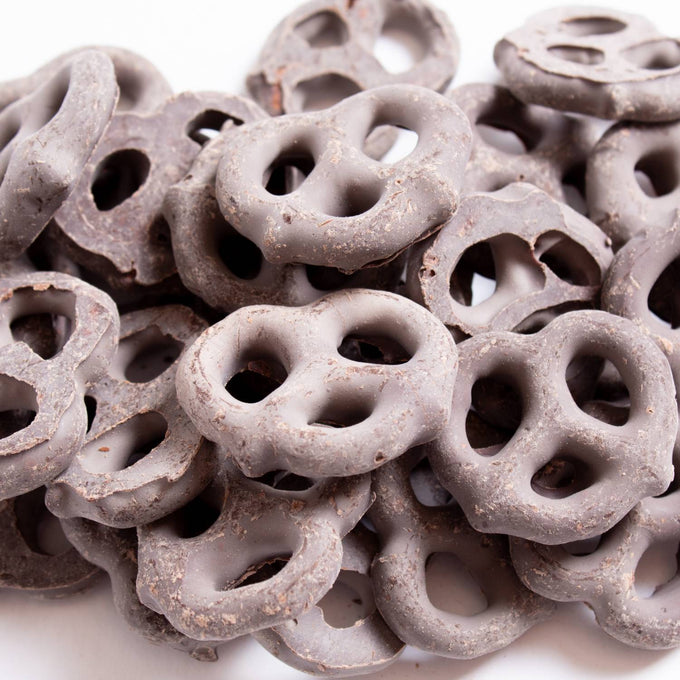 Close-up of handcrafted Amish made mini pretzels coated in rich dark chocolate, a USA made snack perfect for Kitchen & Food, Snacks and Sweets, Candy, Best Sellers, and Promo Eligible collections.