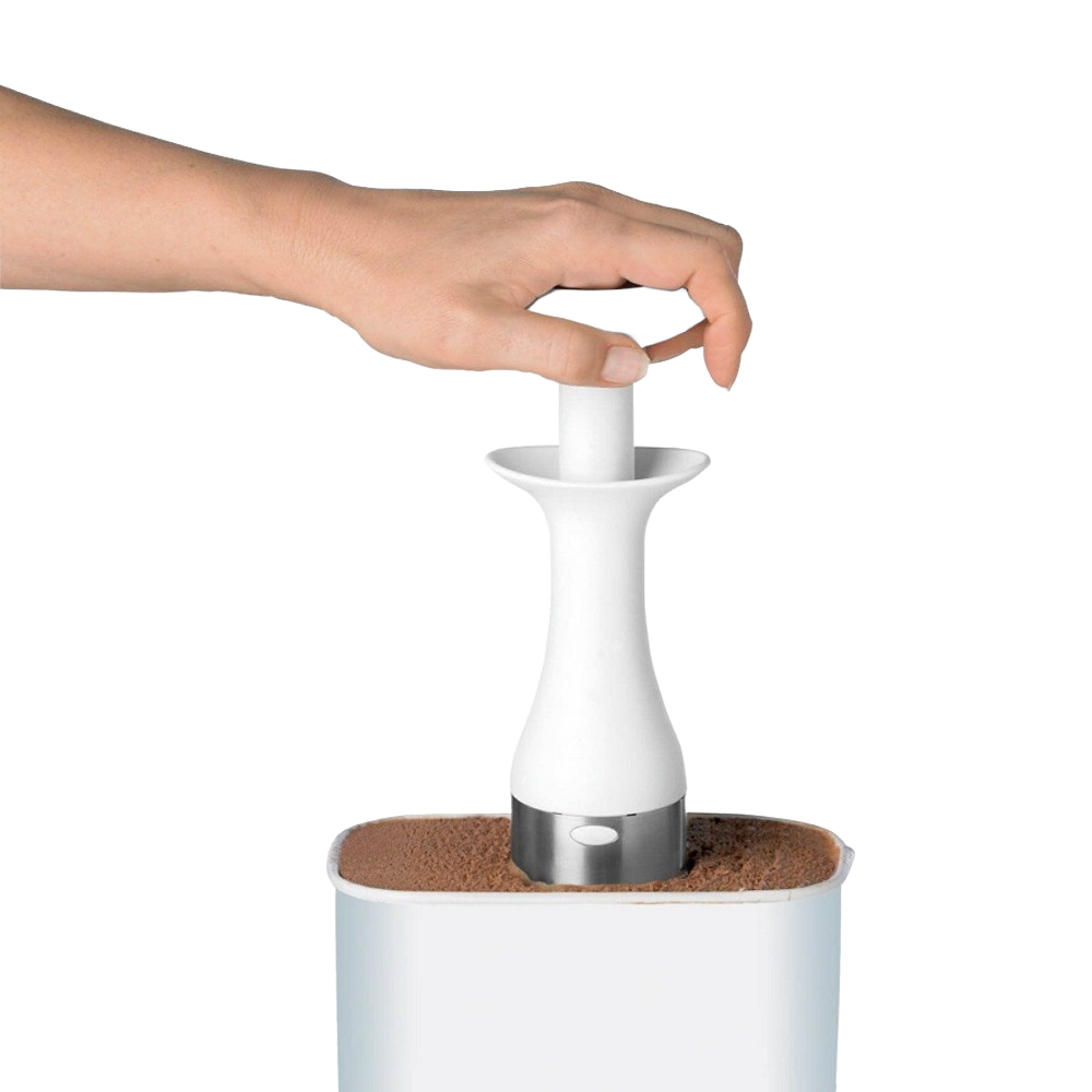 Hand using a white ergonomic ice cream scoop with a stainless steel edge to lift a portion of ice cream from a container, ideal for kitchen and food, cookware, and baking supplies collections.