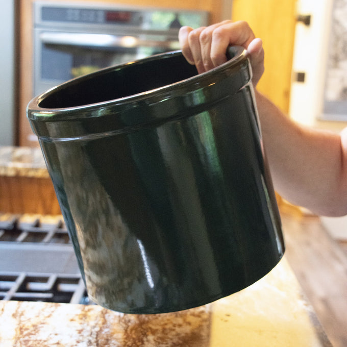 Handcrafted 2-gallon stoneware crock in deep green with lead-free, food-safe glaze, designed for fermenting and preserving, featured in Kitchen & Food and USA Made collections.