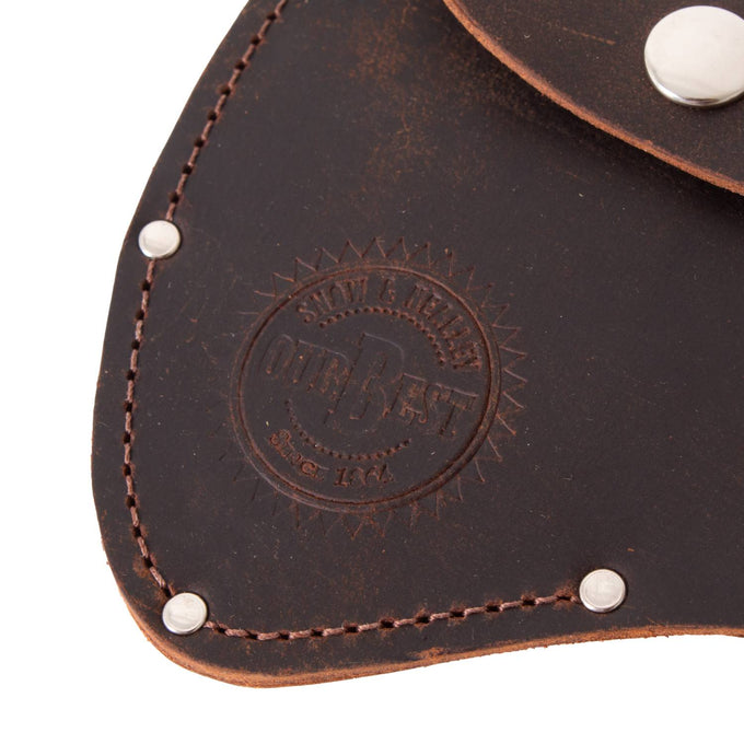 Close-up of a handcrafted full-grain leather axe sheath corner with embossed branding, secured by metal rivets, Amish made in the USA, ideal for Farm, Garden & Tool and Hand Tools collections.