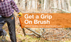 Person using a handcrafted orange log hauler tool to lift and roll brush in a wooded outdoor setting, designed for wood cutting and hauling with ergonomic benefits for farm, garden, and tool collections.