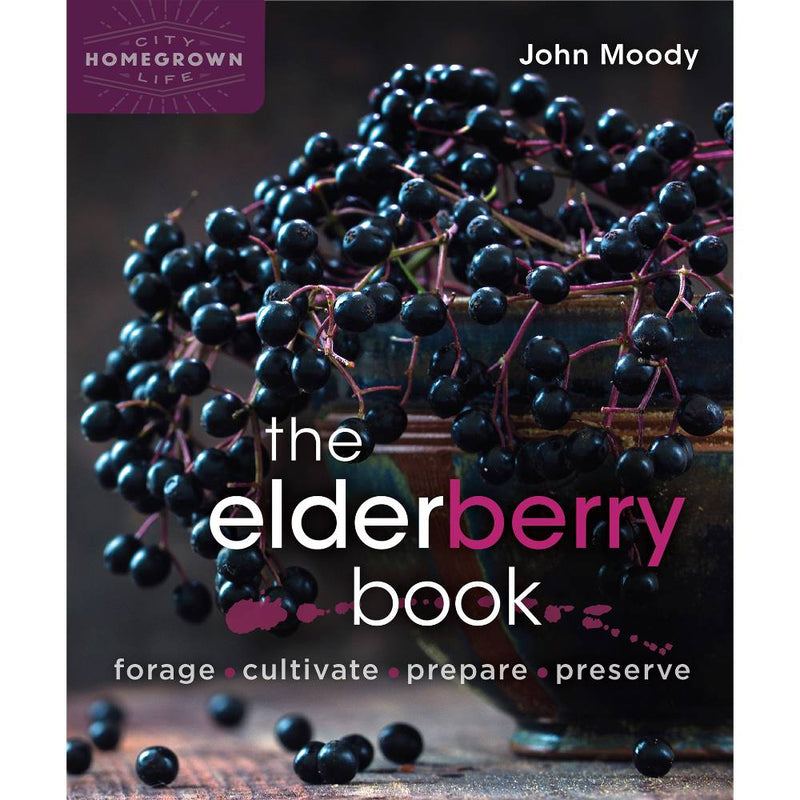 Close-up of clusters of ripe elderberries spilling from a rustic bowl, showcased on a dark wooden surface, representing home garden how-to books and best sellers collections.
