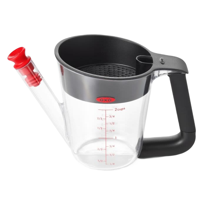 Clear plastic fat separator with black cushioned handle and red stopper, featuring measurement markings and strainer inside, perfect for Kitchen & Food and Cooking and Baking Helpers collections.
